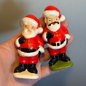 2 Similar Ceramic Cast Painted Vintage Santa Claus Christmas Figurines